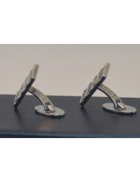 Manchetknapper i sølv.