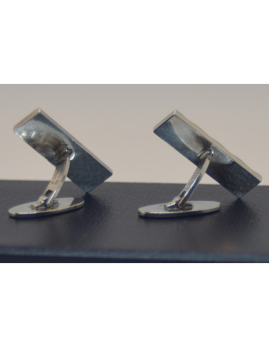 Manchetknapper i sølv.