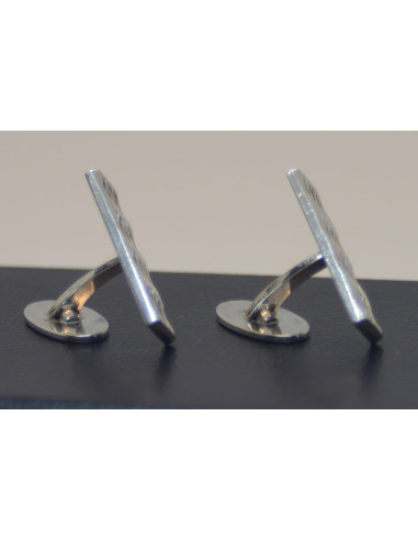 Manchetknapper i sølv.