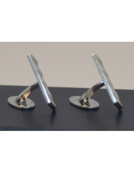 Manchetknapper i sølv.